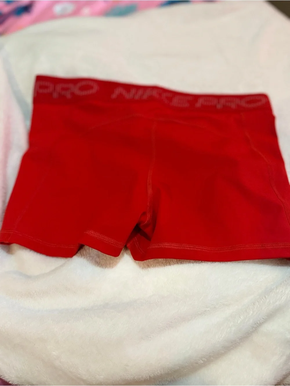 Nike Women’s Red Pro Bike Shorts with Subtle Branding